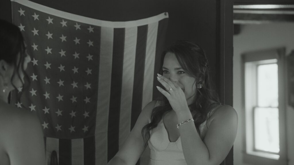 Bridesmaid gets emotional after getting dressed.