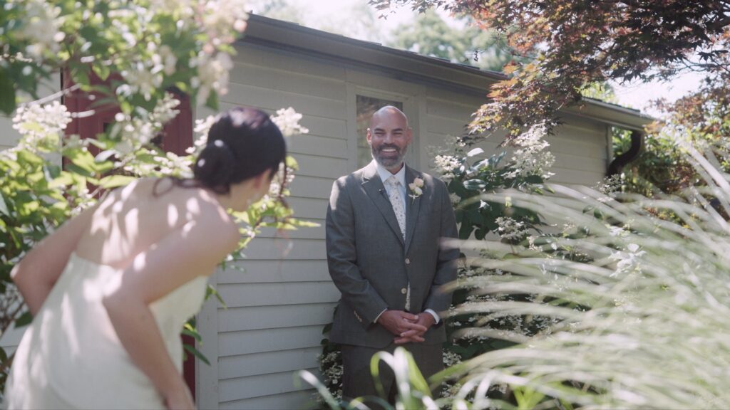 Groom's reaction during the first look